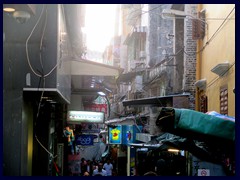 The pedestrian area between Largo do Senado and Ruinas de São Paulo is gritty with a mix of market stands, small shops and restaurants. It is very crowded, mostly with Chinese people. This area looks more Chinese then Portugese.